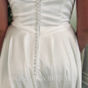 Wedding dress on bride to be in charmeuse fabric