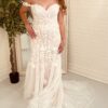 Bride in lace floral wedding dress found over the internet